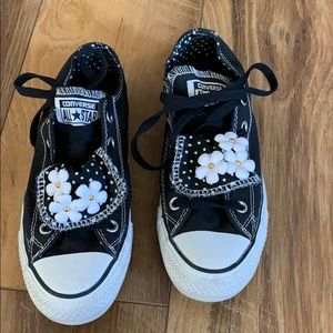 Black Converse shoes with daisy’s and polka dots